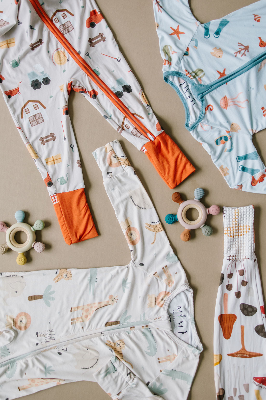 Little sleepies baby bamboo pajamas laying flat with words of affirmation for kids and mothers