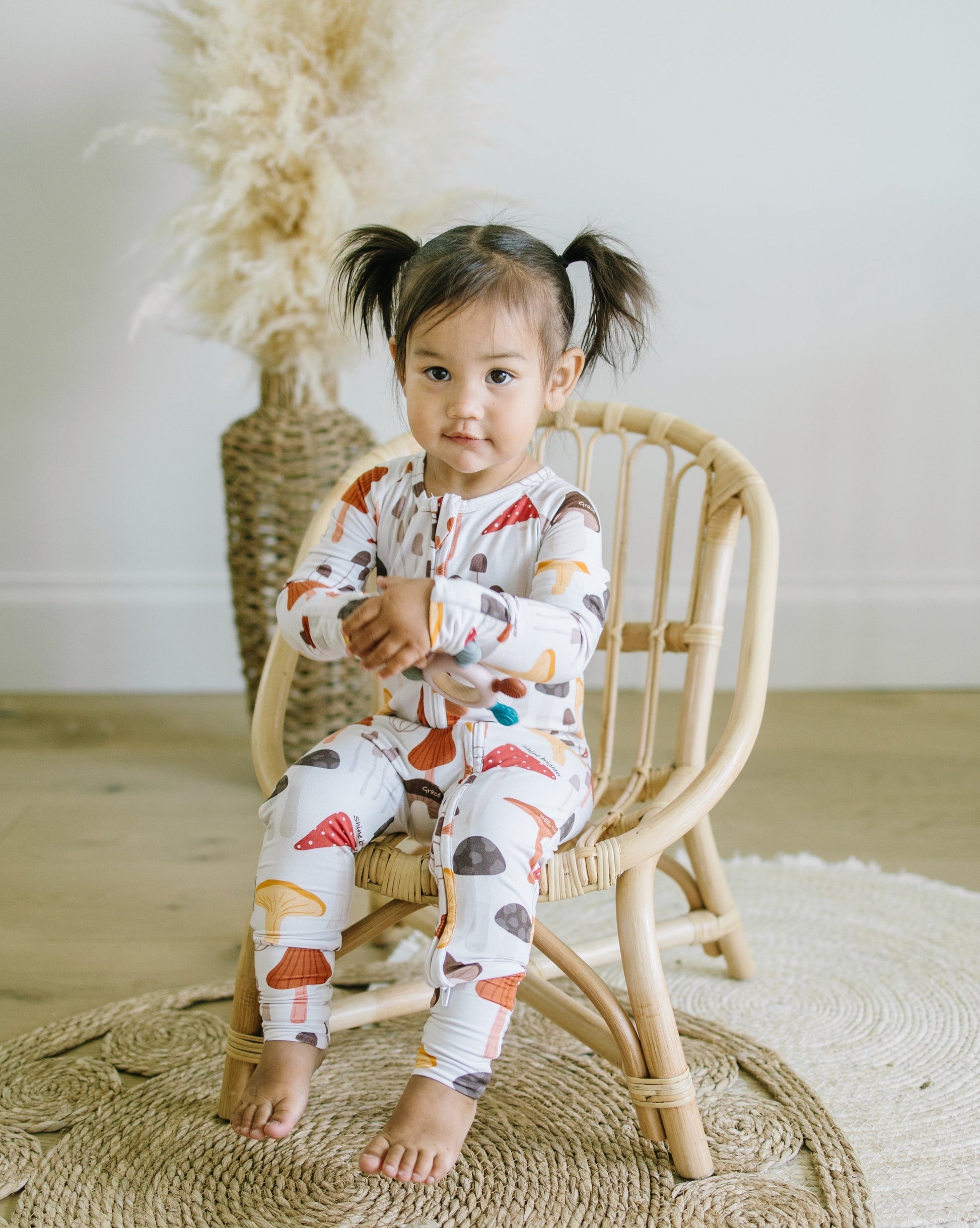 Little sleepies baby bamboo pajamas with mushroom print and words of affirmation for kids and mothers.