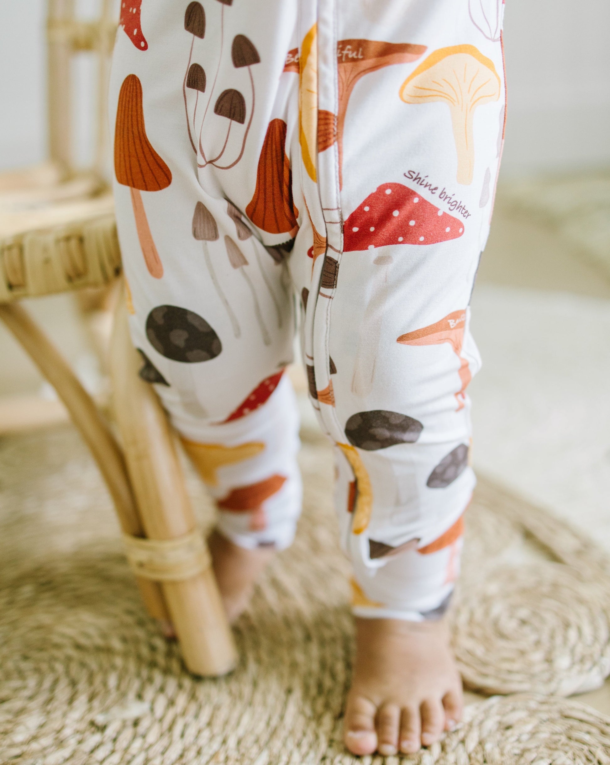 Little sleepies baby bamboo pajamas with mushroom print and words of affirmation for kids and mothers. Shine Brighter